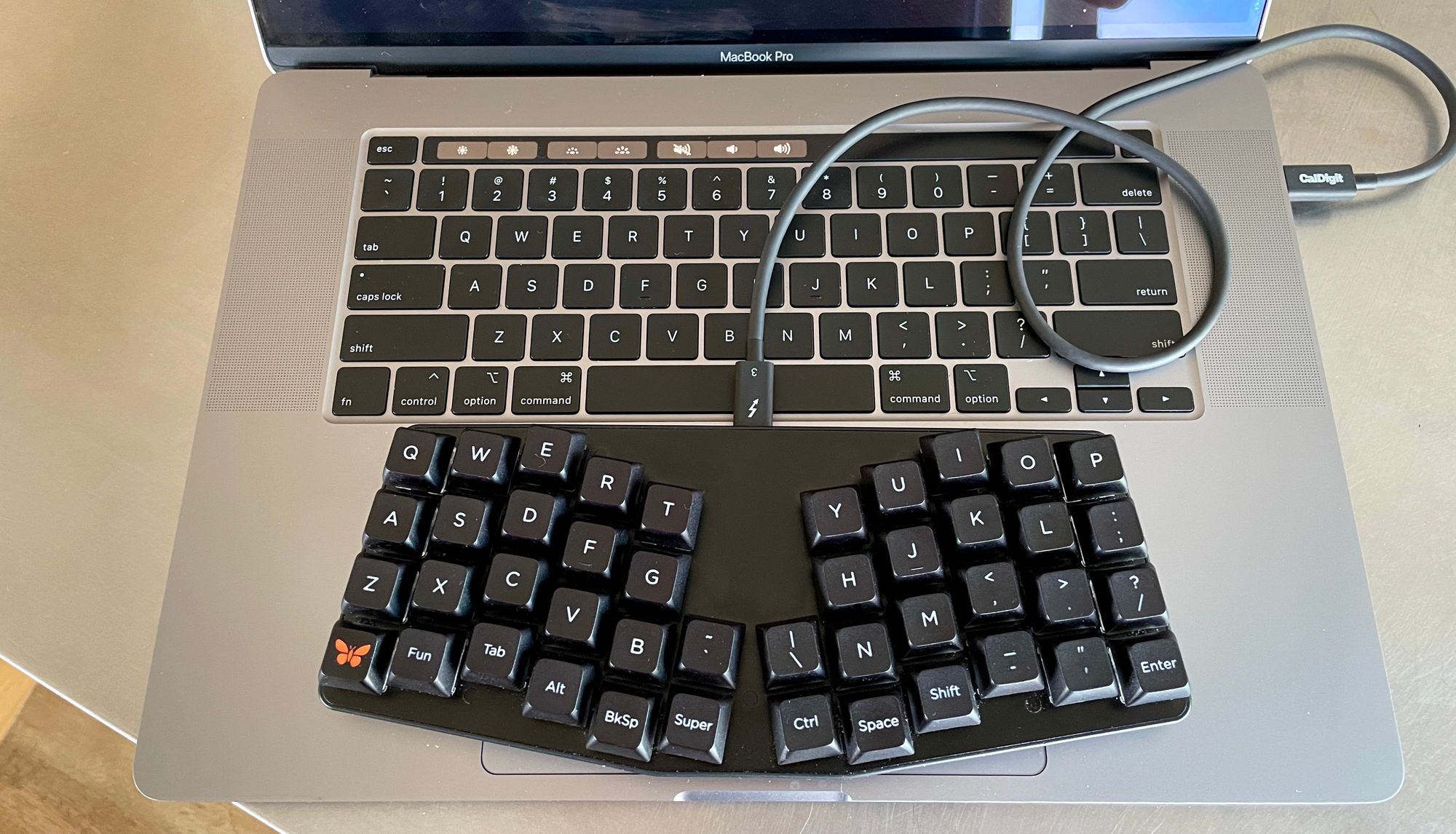 I don't have a small enough mouse to fit on the side, but I have seen people do this.